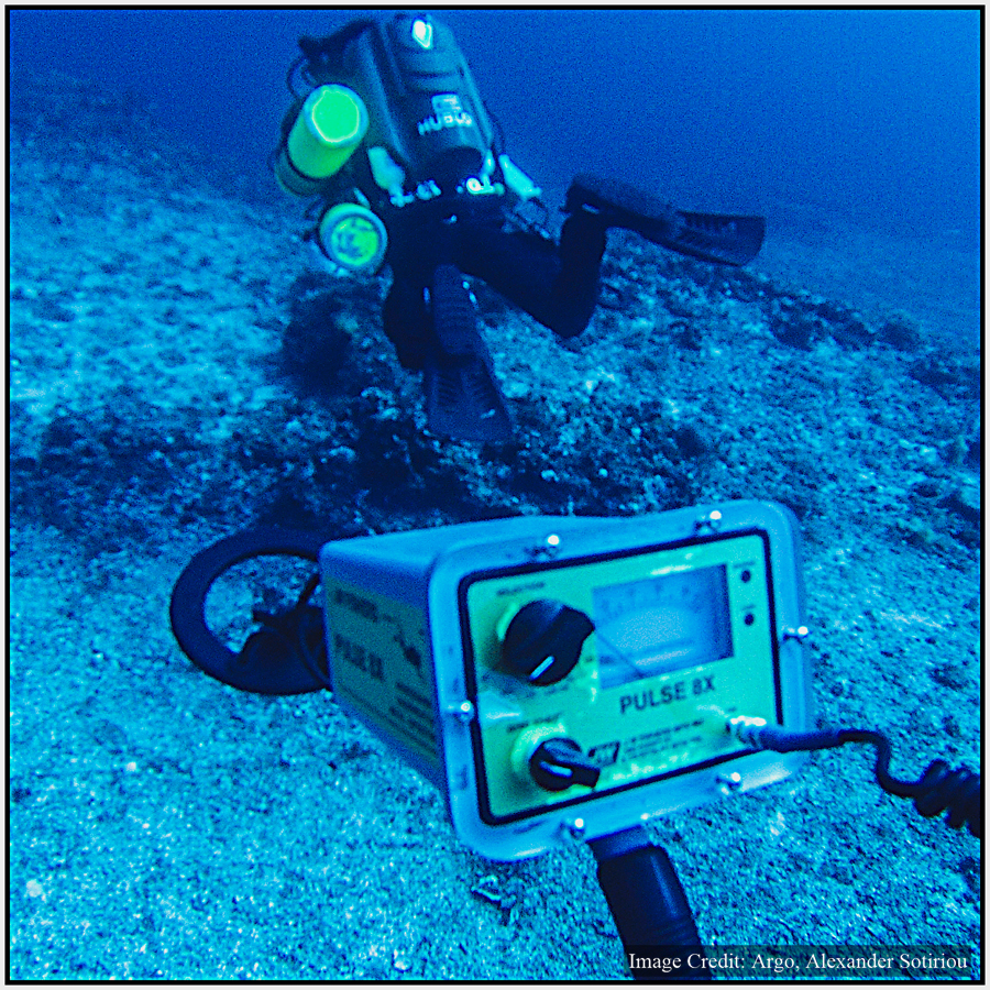 Conducting a metal detector survey of the Antikythera wreck site.